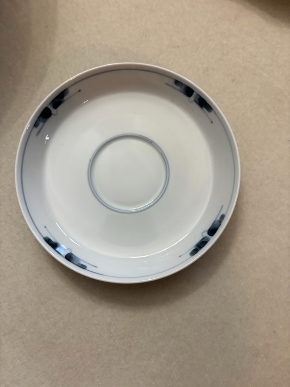 Royal Copenhagen White Porcelain Saucer with Blue Brush Accents